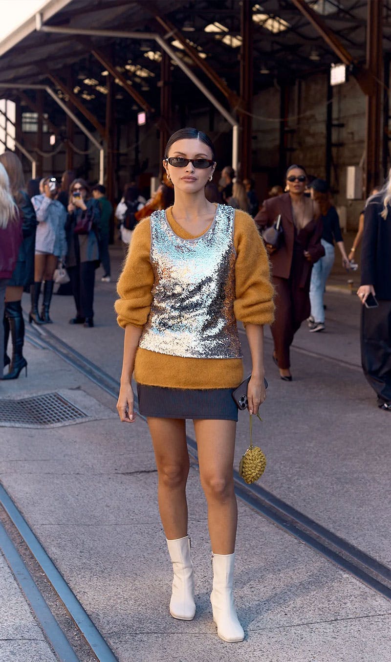 Woman wearing Saint Laurent Shade sunglasses