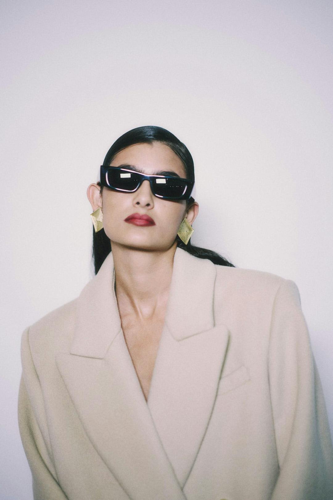 Model wearing Saint Laurent SL553 sunglasses